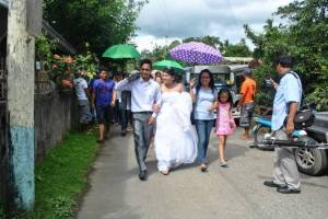 Traditional dapit at a Tagalog wedding